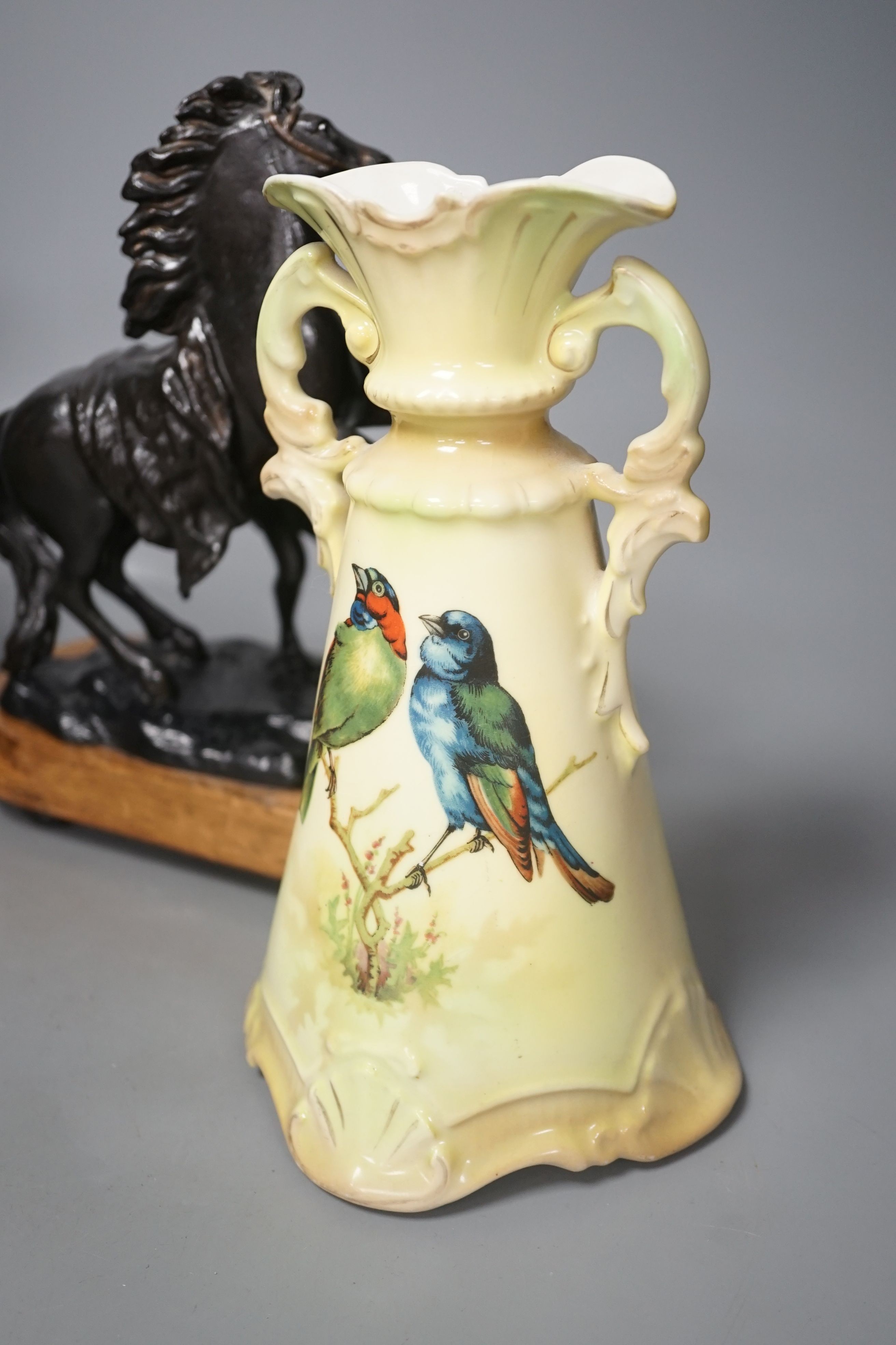 A small pair of painted spelter Marly horses and a pair of Austrian ceramic vases, tallest 23cm